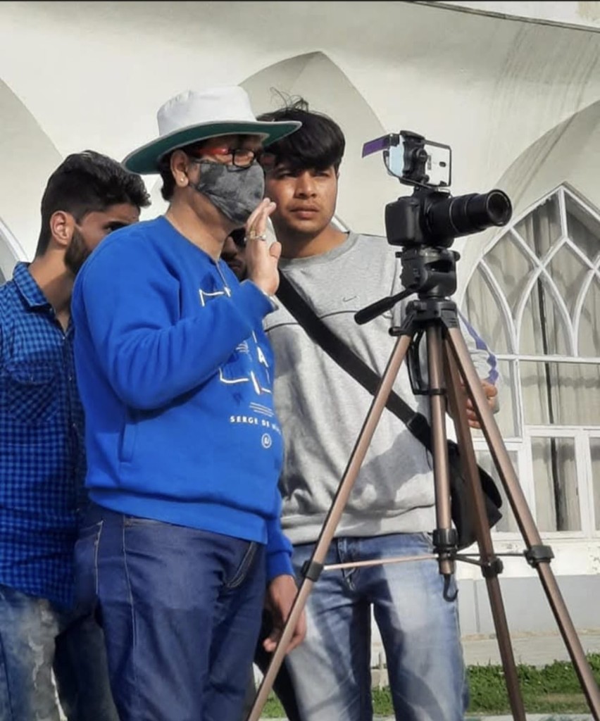 Outdoor production team filming music video